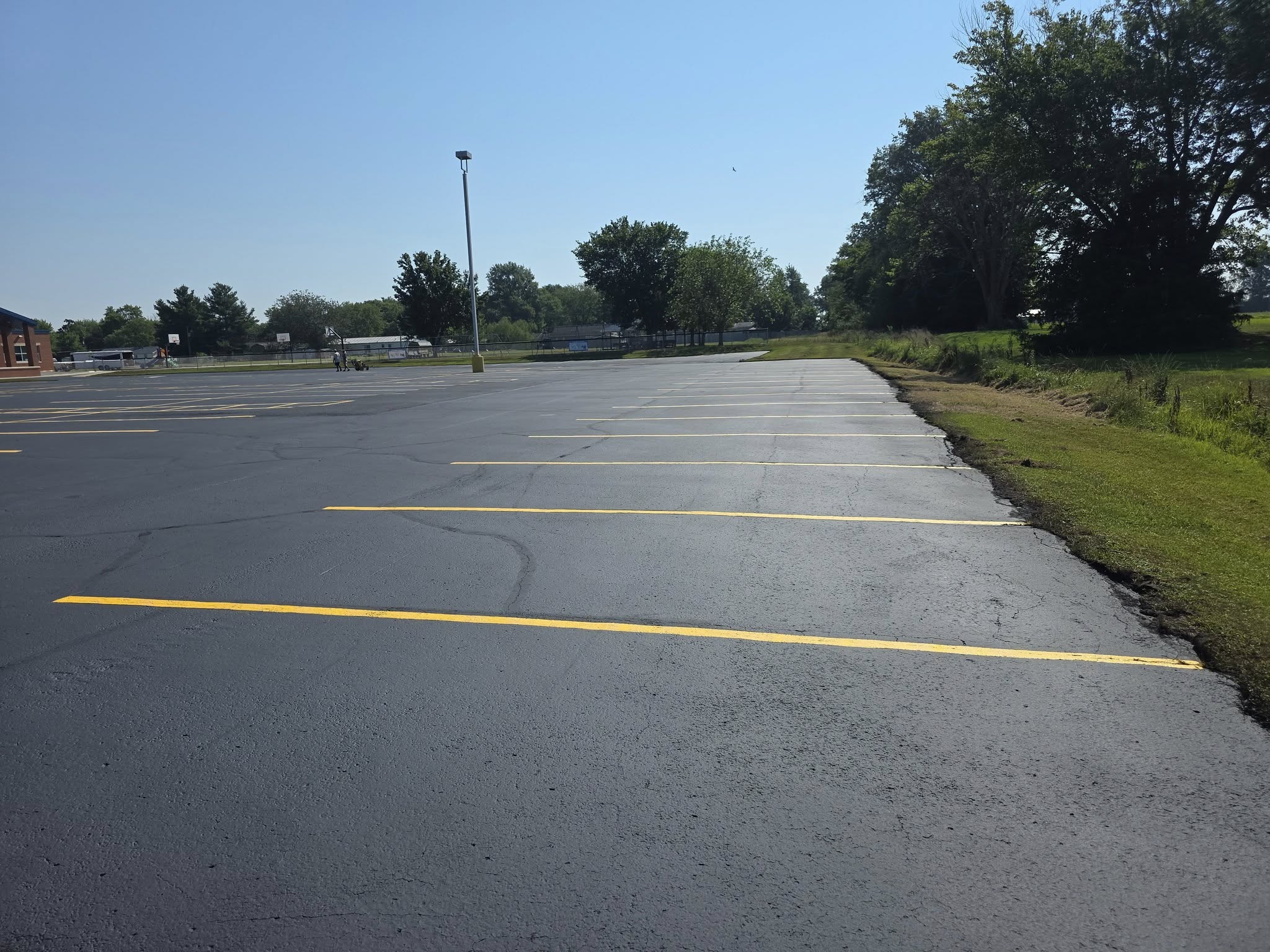 Newly sealed and striped parking lot in West Frankfort, IL